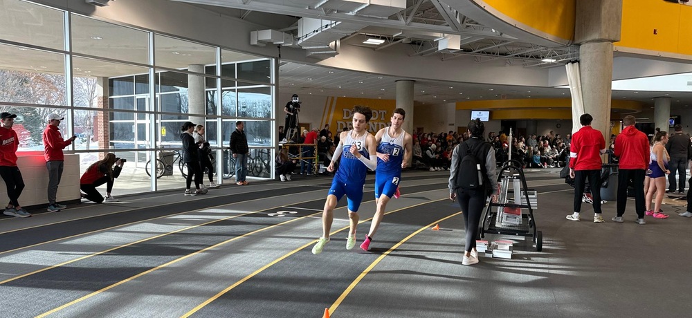 BALDAUF SETS SCHOOL RECORD IN MILE, SAYLER RIGHT BEHIND FOR 2ND ALL-TIME