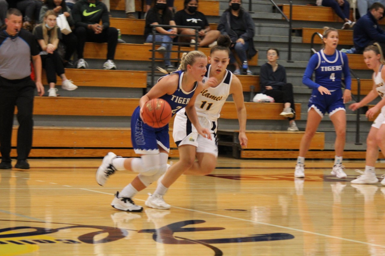 TIGERS CLAW OUT ROAD VICTORY 74-63 OVER COLLEGE OF SAINT MARY IN GPAC ACTION