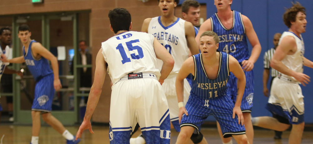 Senior Tate Martin looks to defend on Tuesday night as the Tigers defeated University of Dubuque 84-67 in Las Vegas.